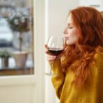 Woman enjoying a glass of wine