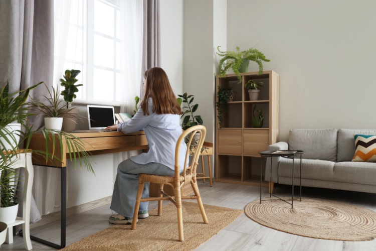 A woman working from home.