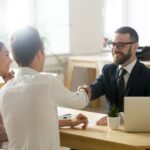 A couple meeting with a financial planner.