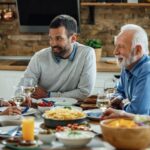 Multiple generations enjoying a family dinner.