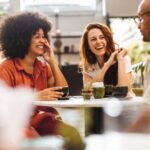 A group of friends talking in a café.