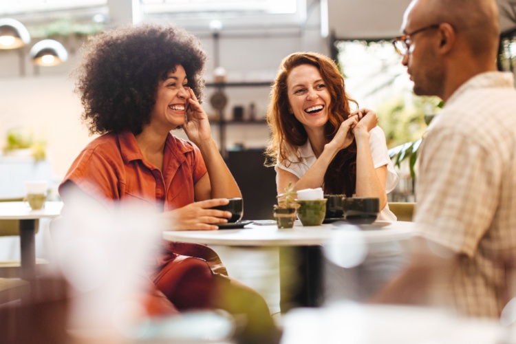 A group of friends talking in a café.