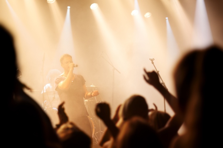 A band on stage at a gig.