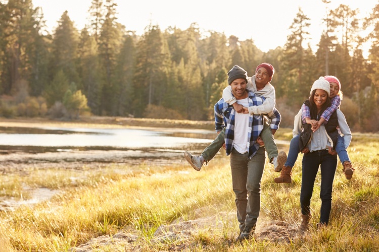 A family hiking in the woods.