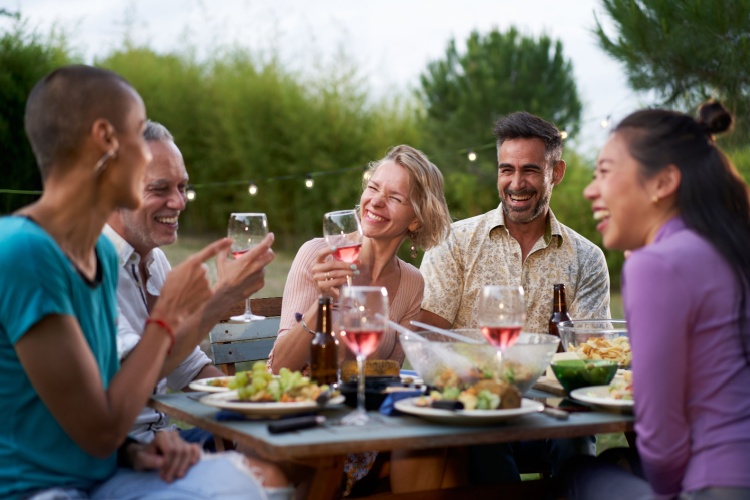 A group of friends dining outside.