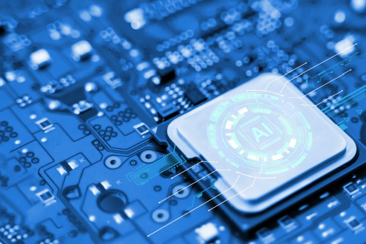 A computer central processing unit with “AI” written on it.