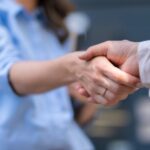 Two people shaking hands