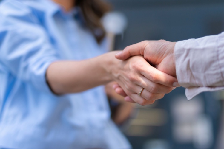 Two people shaking hands