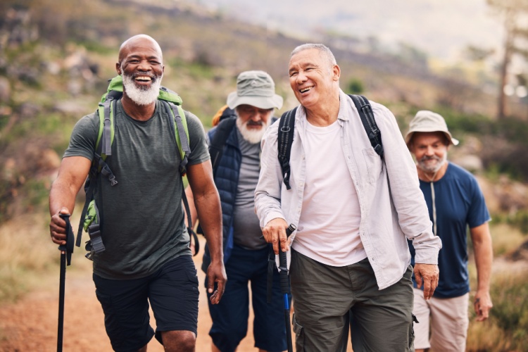 A group of men hiking together.