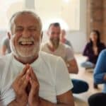 A group of people meditating.