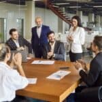 A group of employees in a meeting.
