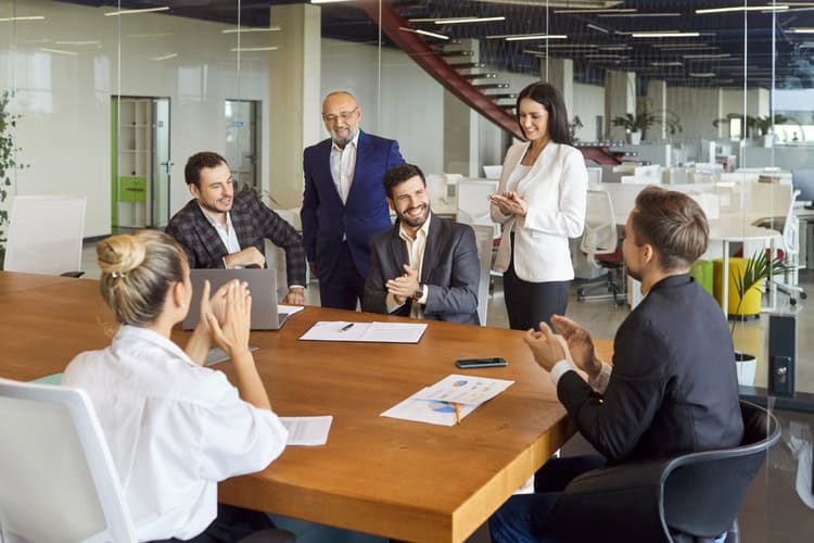 A group of employees in a meeting.