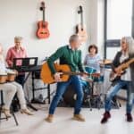A group of people playing instruments.