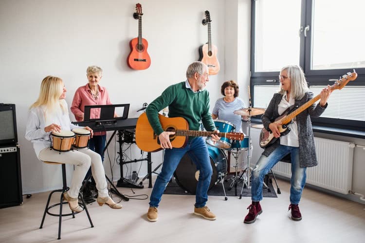 A group of people playing instruments.